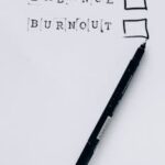 A pen beside checkboxes labeled 'Balance' and 'Burnout'. Choose wisely.